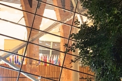 Former 1 WTC Trident Beams Seen Thru Glass Of The National 9-11 Memorial And Museum