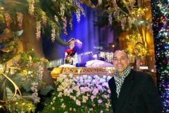 Guest Poses In Front Of Sak's Fifth Aveune Holiday Window Display